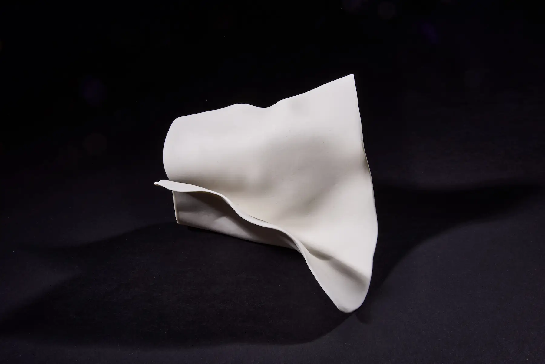 Touchpaper — Screwed Up, hand-built porcelain form resembling screwed paper. Studio Willis.