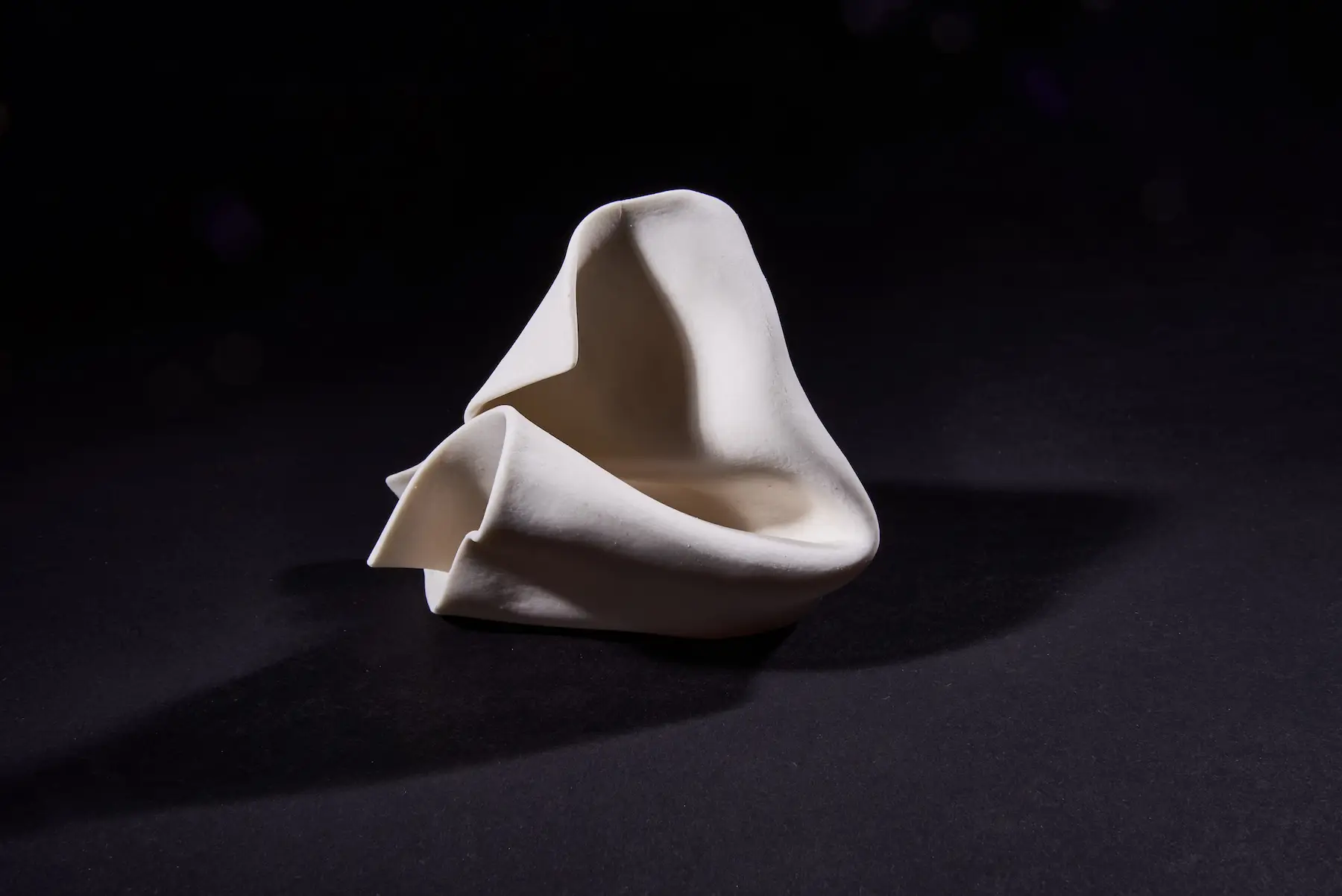Single — Screwed Up, hand-built porcelain form resembling screwed paper. Studio Willis.